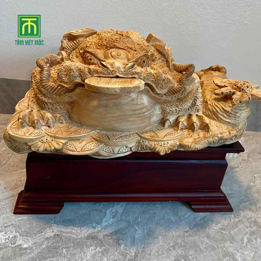 Tượng cóc ngậm tiền mang ý nghĩa thu hút tài lộc